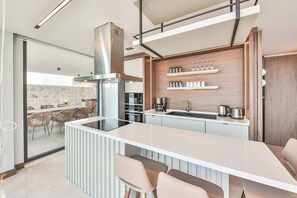 Fridge, microwave, oven, dining tables