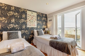 2 habitaciones, wifi gratis y ropa de cama 