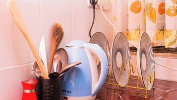 Deluxe Studio, City View | Private kitchen | Fridge, microwave, electric kettle, cookware/dishes/utensils