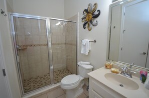 Shower, towels, soap, toilet paper
