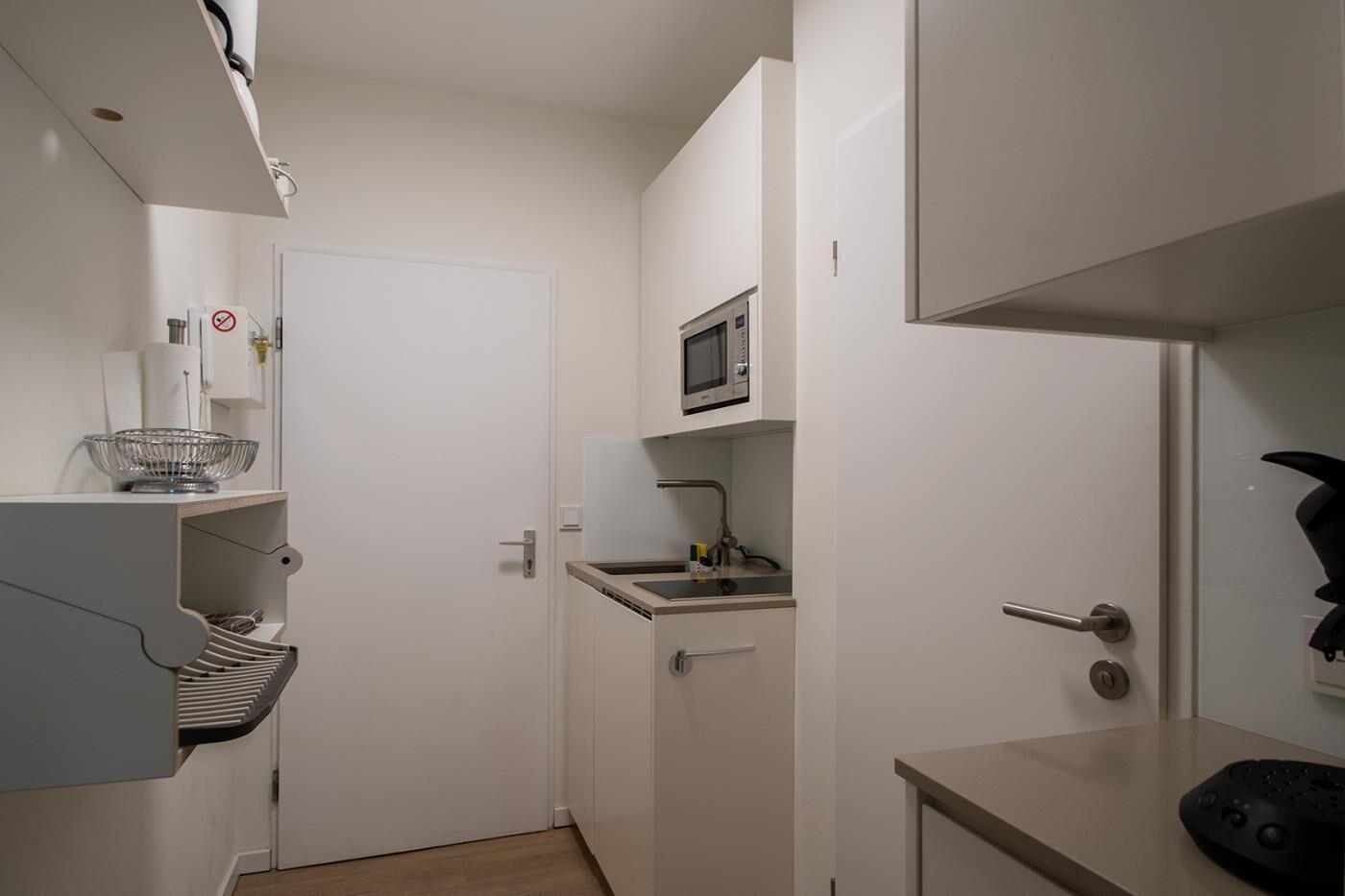 Fridge, stovetop, dishwasher, coffee/tea maker