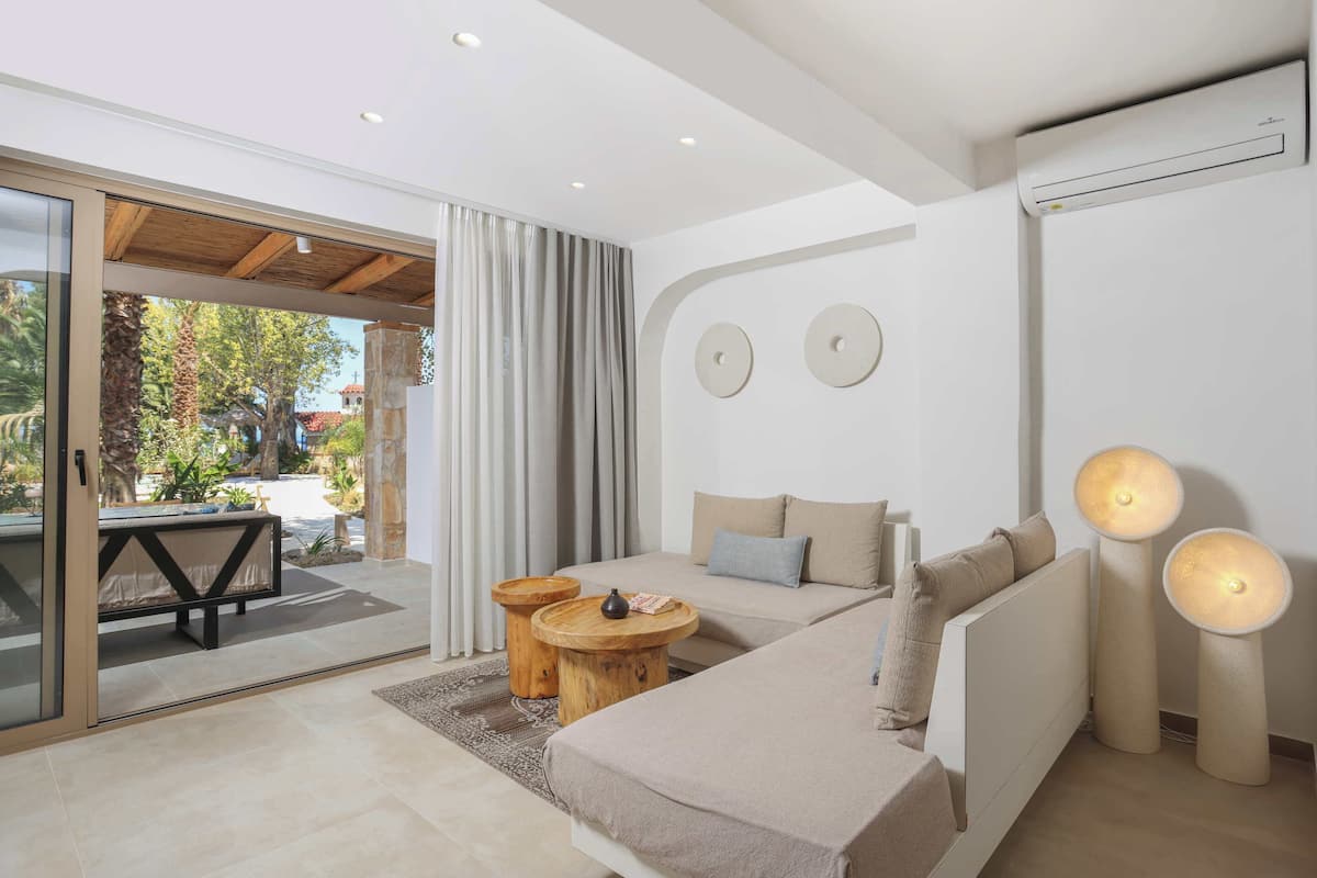 Suite Exécutive, 1 chambre, vue piscine | Coin séjour