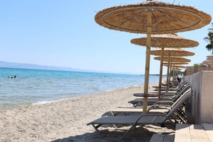 Private beach, sun loungers, beach umbrellas, beach towels