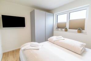 1 dormitorio, cuna de viaje, wifi gratis y ropa de cama