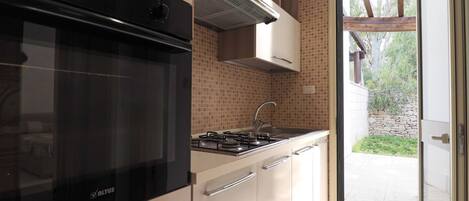 Refrigerador, horno, placa de cocina, cafetera/tetera