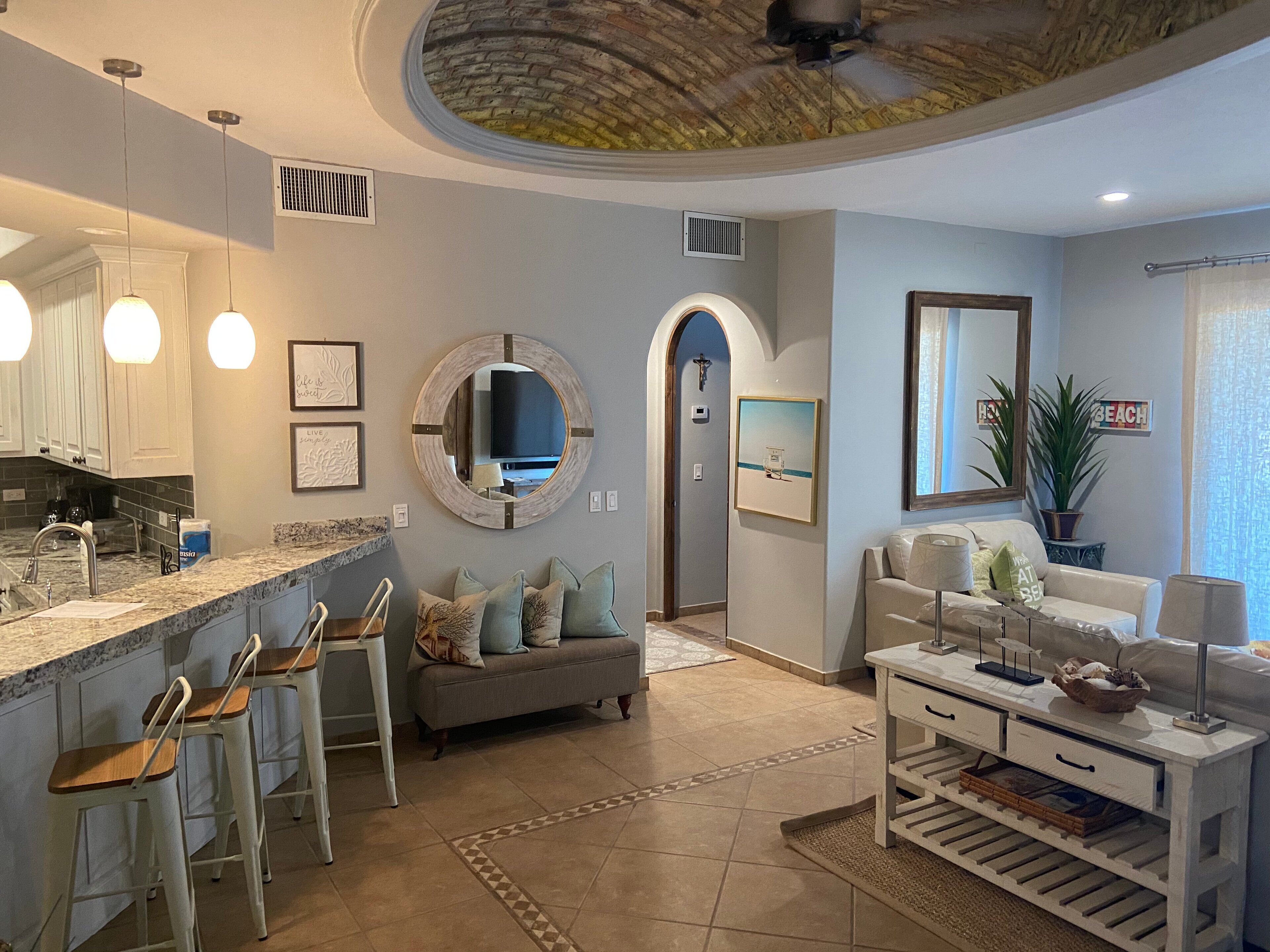 Condo, Multiple Beds, Balcony (Bella Sirena BA 102) | Living area | 42-inch flat-screen TV with digital channels, DVD player