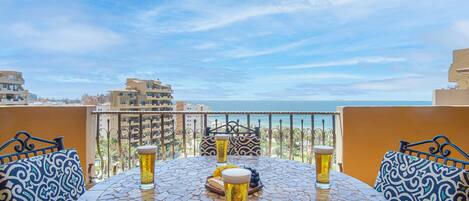 Condo, 1 King Bed with Sofa bed, Balcony (Bella Sirena BD 703) | Outdoor dining