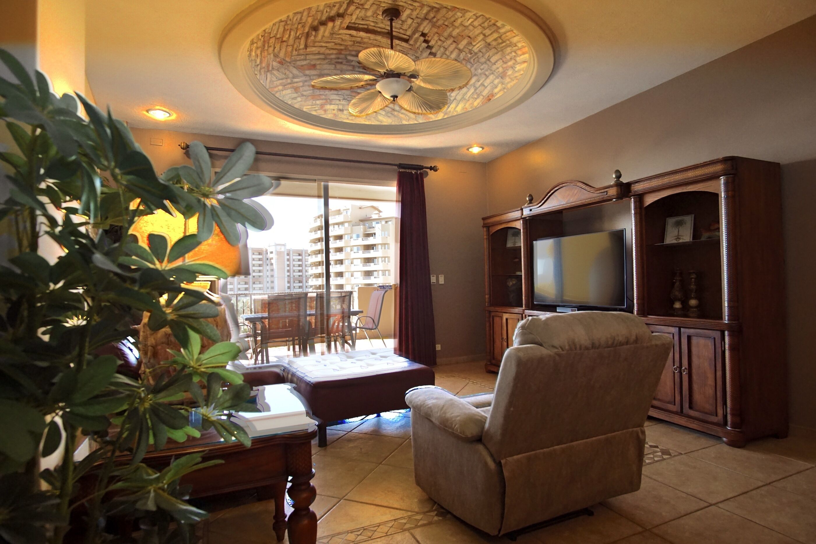 Condo, 1 King Bed with Sofa bed, Pool Access (Bella Sirena BB 303) | Living area | 42-inch flat-screen TV with digital channels