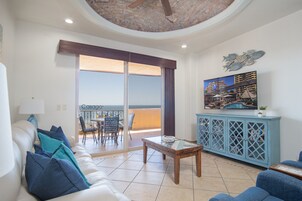 Condo, 1 King Bed with Sofa bed, Balcony (Bella Sirena BD 703) | Living area | 42-inch flat-screen TV with digital channels