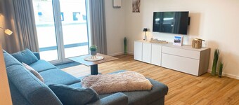 KÜSTE33/16 - Penthouse with far-reaching views. Sauna. Dogs allowed.