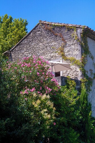 Magnificent apartment in 18th century Priory, with swimming pool and lush grounds