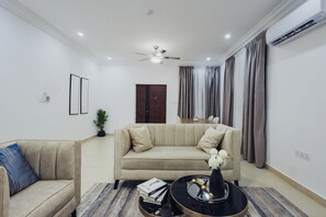 Living area - PARADISE 2: Stylish 2BR with premium finishes, custom décor & stunning views. (Takoradi)
