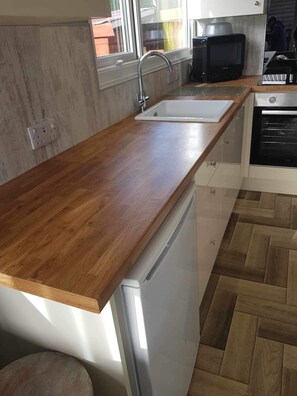 Chalet | Cuisine privée | Réfrigérateur, micro-ondes, four, plaque de cuisson