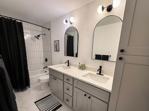 Hair dryer, towels, soap, shampoo