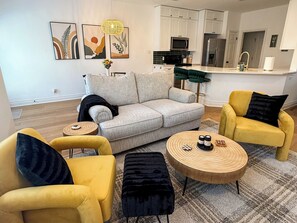 Smart TV, fireplace, books, computer monitors