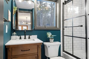 Shower, eco-friendly toiletries, hair dryer, towels