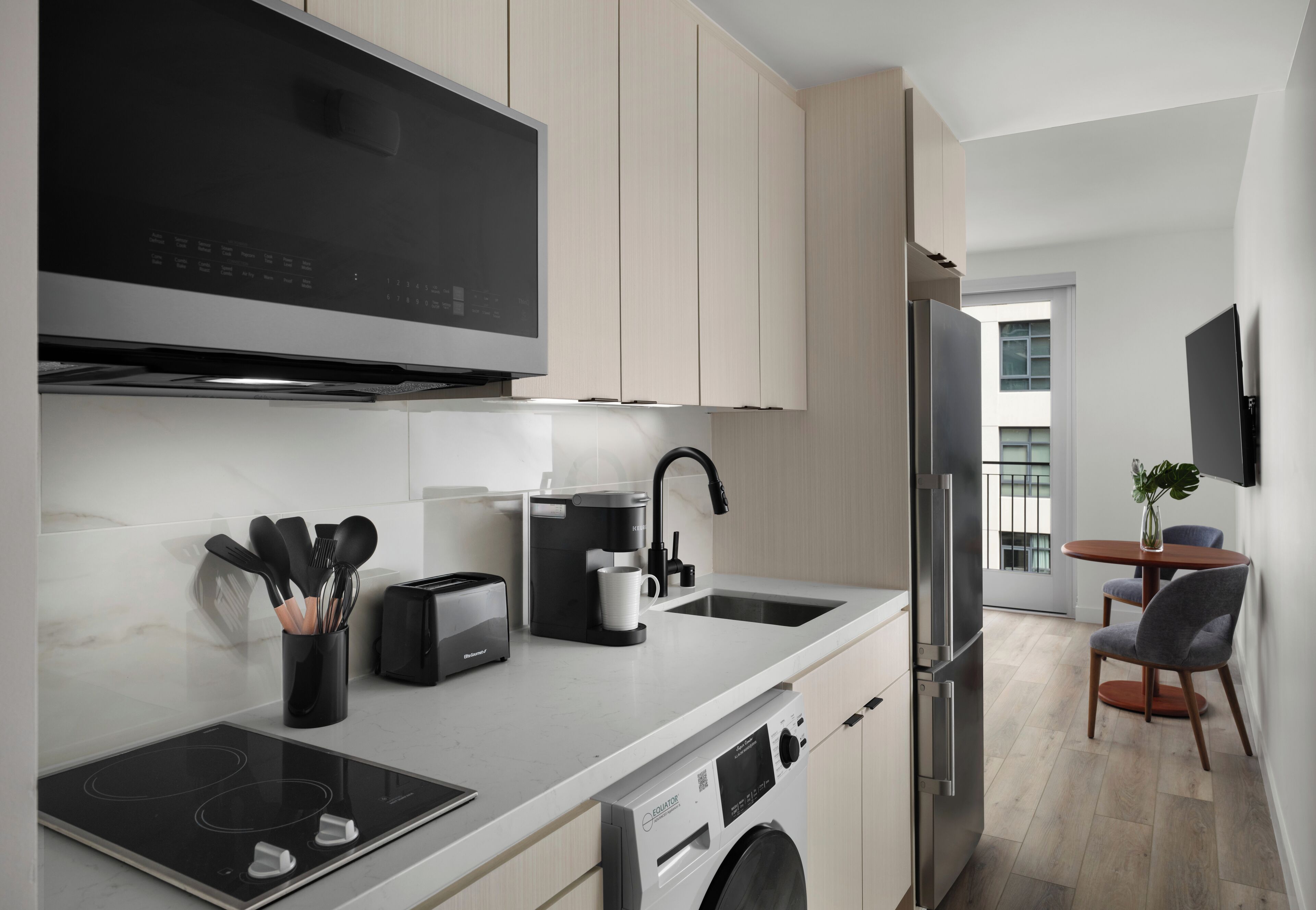 Queen Signature Suite with View | Private kitchen | Full-size fridge, microwave, stovetop, coffee/tea maker