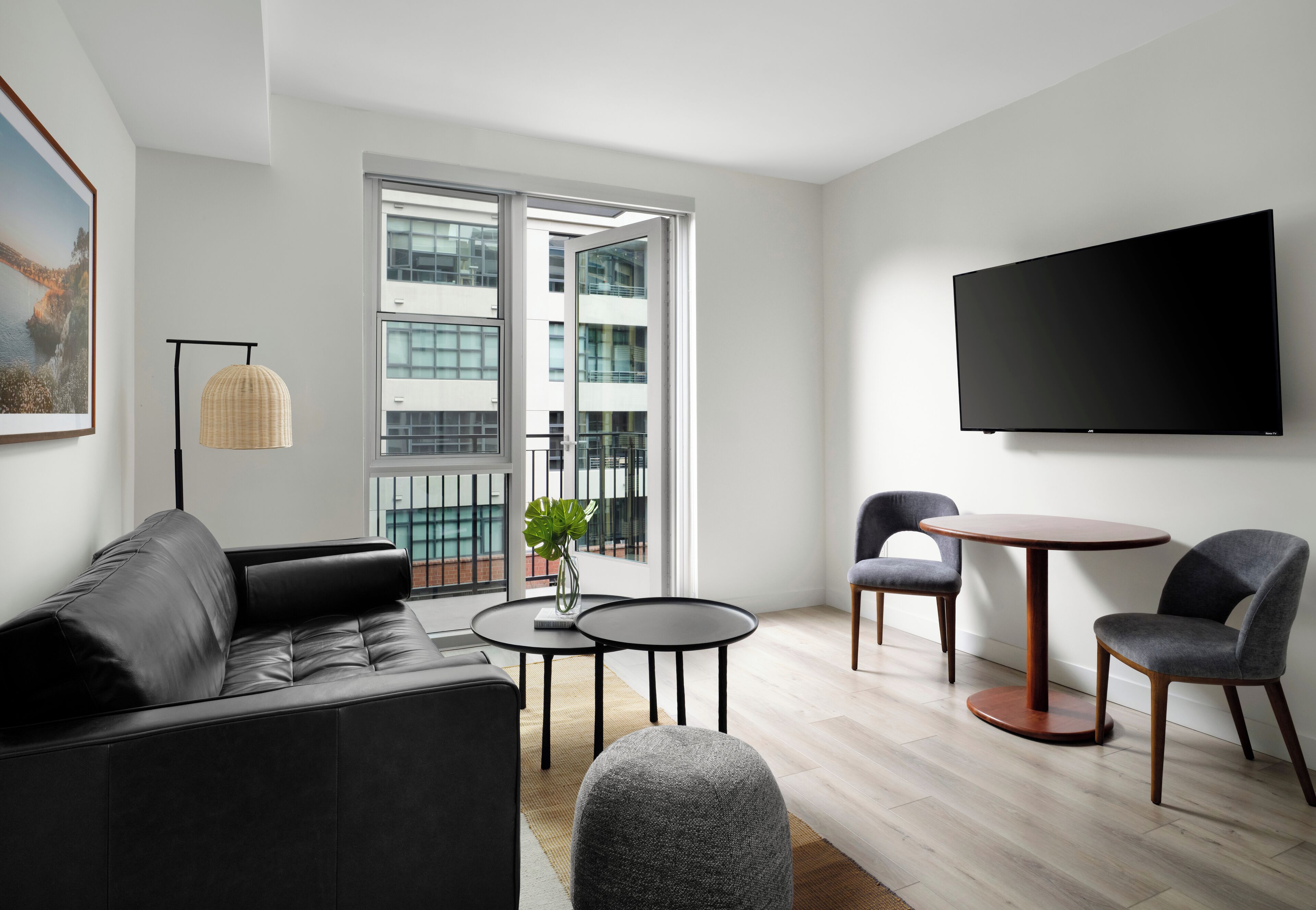 Deluxe Balcony Suite | Living area | 55-inch flat-screen TV with cable channels, Netflix, Hulu