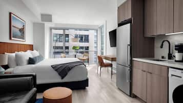 Premium bedding, pillow-top beds, laptop workspace, free WiFi