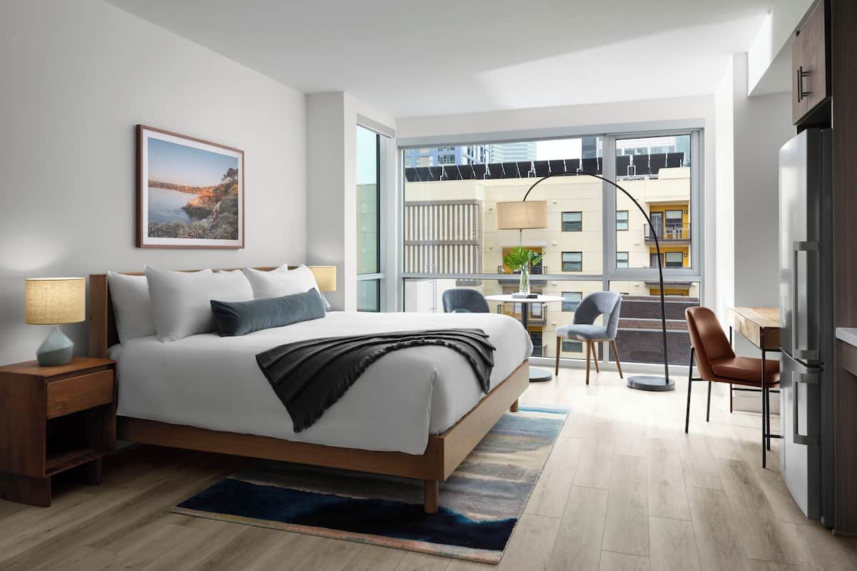 Premium bedding, pillowtop beds, desk, laptop workspace