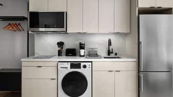 Full-size fridge, microwave, stovetop, coffee/tea maker