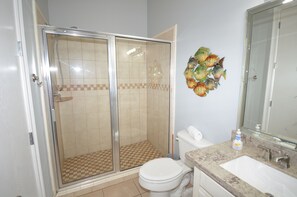 Shower, towels, soap, toilet paper