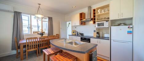 Fridge, microwave, dishwasher, coffee/tea maker