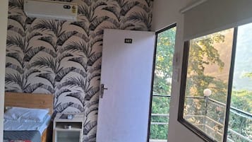 Deluxe Room, Balcony, Hill View | Desk, laptop workspace, free WiFi