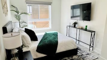 2 bedrooms, desk, iron/ironing board, travel cot