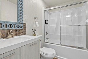 Hair dryer, towels, soap, shampoo
