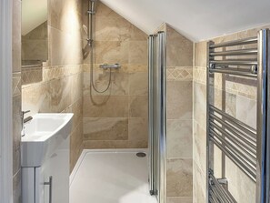 A modern bathroom with a walk-in shower, a standalone bathtub, and a glass-enclosed shower stall. - Escape to this picturesque retreat in Salton, near Malton. (Salton, near Malton)