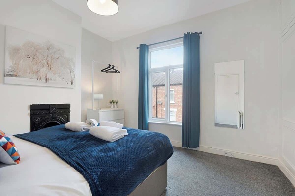 Bedroom 1 offers flexibility and comfort with a cosy double bed, ensuring a restful retreat for a peaceful night's sleep.