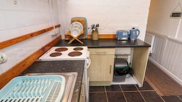 Fridge, electric kettle, toaster, cookware/dishes/utensils
