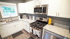 Fridge, microwave, oven, stovetop - Cozy 3-Bedroom Home with WiFi & AC – Just 8 Minutes from the Airport! (Atlanta)