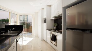 Een koelkast, een magnetron, een oven, een kookplaat