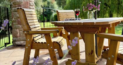 Woodland edge retreat, with wood burning stove.