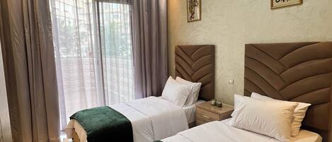 2 quartos, ferros/tábuas de passar roupa, Wi-Fi, roupa de cama