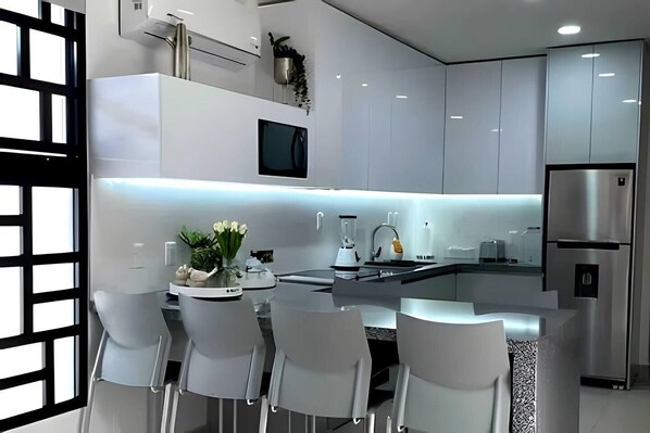 Fridge, microwave, coffee/tea maker, toaster