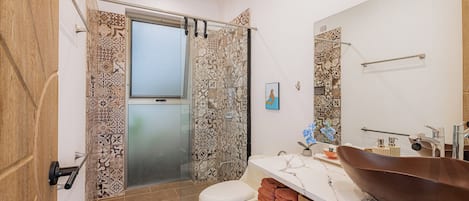 Shower, hair dryer, towels, soap