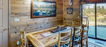 Spacious cabin with bunk house, game room, river view, patio, and fire pit