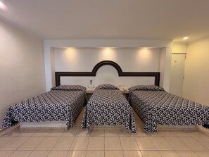Classic Triple Room, Multiple Beds | Down comforters, individually decorated, individually furnished, desk