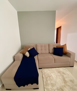 Living area - Apartamento para 4 pessoas com AC (Foz do Iguaçu)