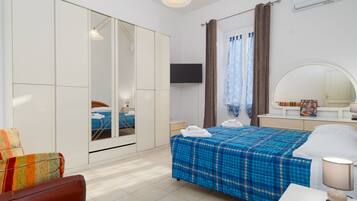 1 chambre, fer et planche Ă repasser, Wi-Fi, draps fournis