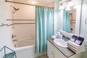 Hair dryer, towels, soap, shampoo