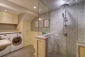 Shower, hair dryer, towels, soap