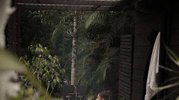 Unwind in the outdoor bath, surrounded by nature. With hot and cold water and plenty of space for two, it's the perfect spot to soak and relax under the open sky.