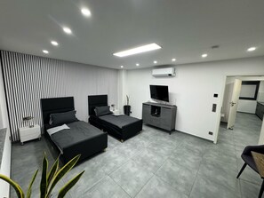 3 slaapkamers, een strijkplank/strijkijzer, wifi, beddengoed