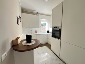 Réfrigérateur, four, plaque de cuisson, lave-vaisselle