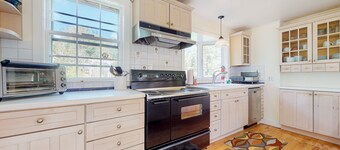 Delightful updated farmhouse with original features, patio, and & W/D