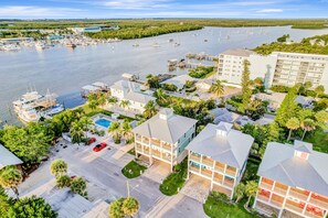 Exterior - Water-view villa with sunset balconies, grill, & pool - walk to beach and dining (Fort Myers Beach)
